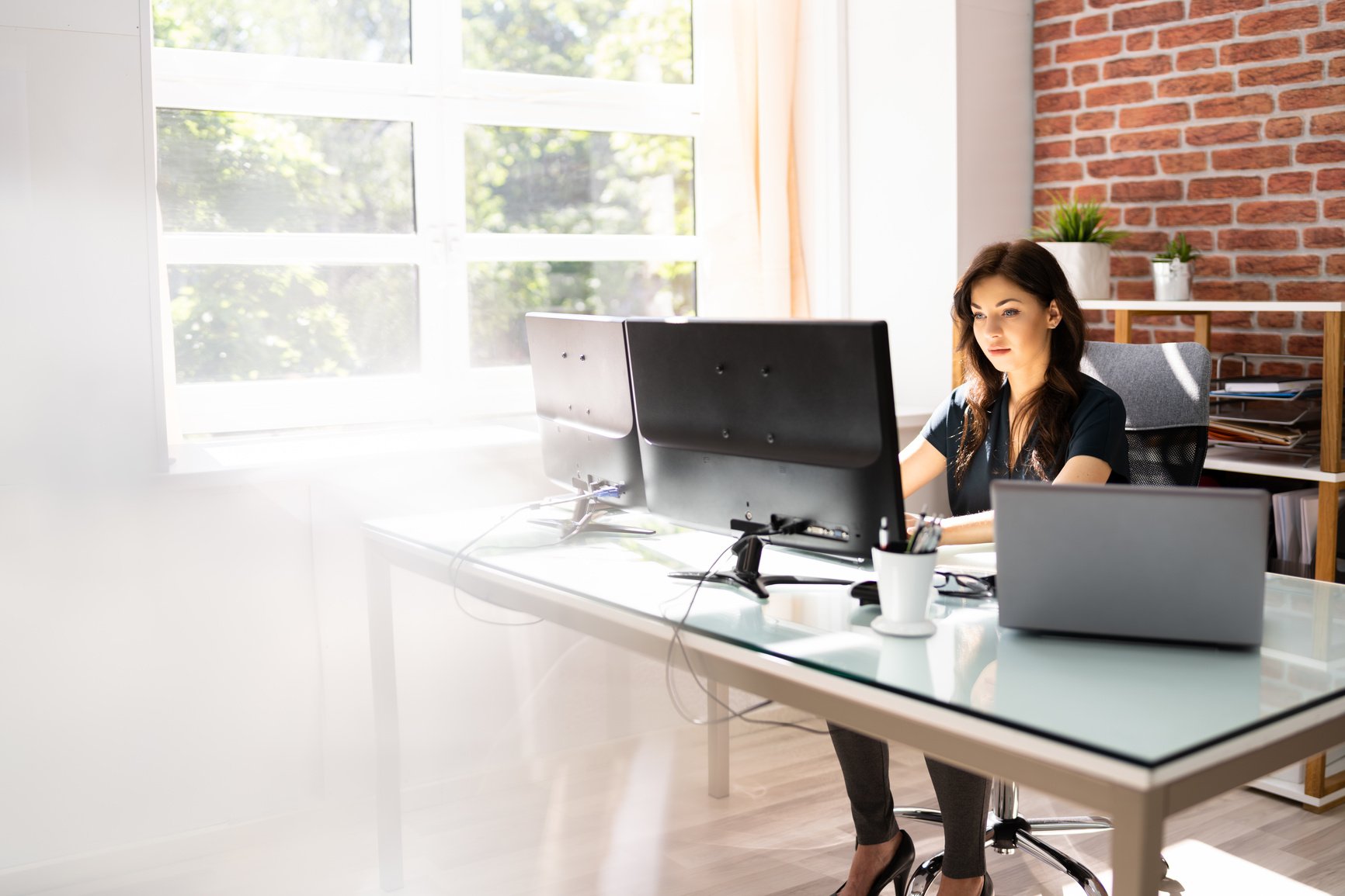 Woman Working On PC Computer